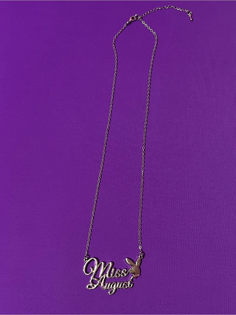 Vintage Playboy Bunny Miss August necklace
